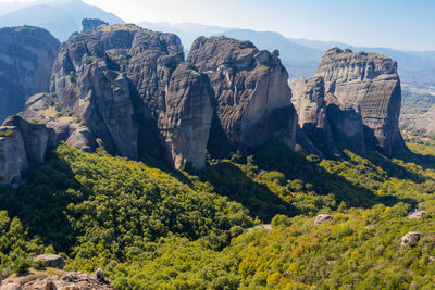 Panoramic view of rocks and mountains against sky