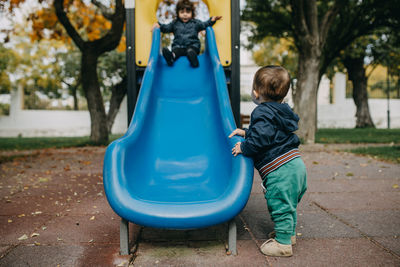 Full length of boys on playground