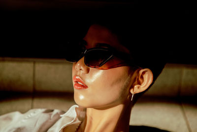 Close-up of woman wearing sunglasses