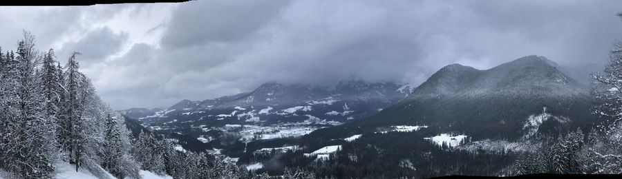 Panoramic shot of snowcapped mountains against sky