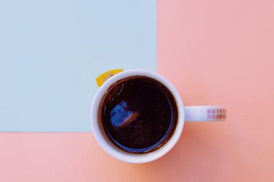 Directly above shot of coffee cup on table