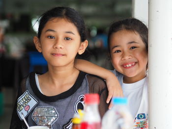 Portrait of smiling siblings