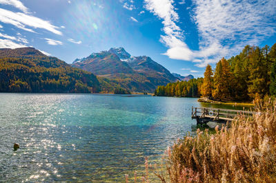 Lake sils maria, in the engadine, photographed in autumn, with landscape and the mountains above it.