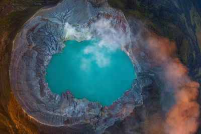 High angle view of hot spring in volcanic crater