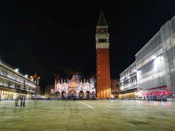 View of city lit up at night