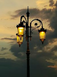 Low angle view of street light against sky