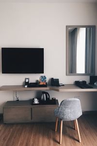 Chairs and tables on hardwood floor at home