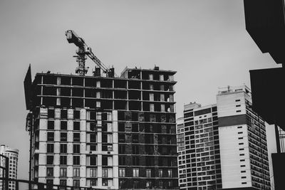 Low angle view of building against sky in city