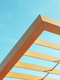 Low angle view of building against clear blue sky