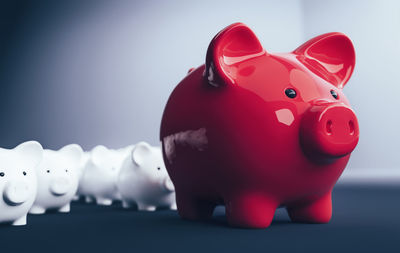 Close-up of red toy against gray background