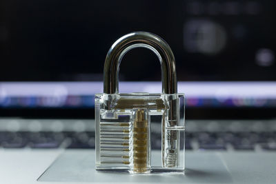 Close-up of padlock on keyboard