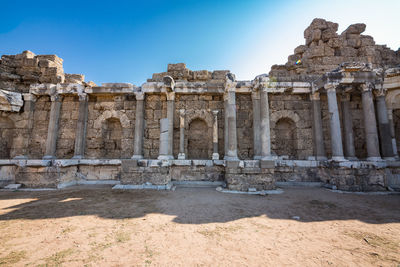 Old ruins of temple against clear sky