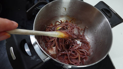 Close-up of person preparing food in kitchen