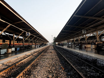 View of railroad station platform against clear sky