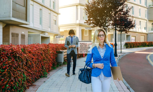 Woman standing in a city