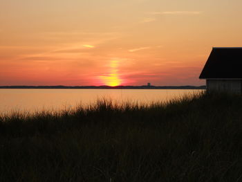 Scenic view of sea against sky during sunset