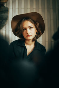 Young woman wearing hat