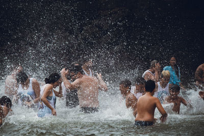 People enjoying in water