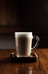 Close-up of coffee cup on table