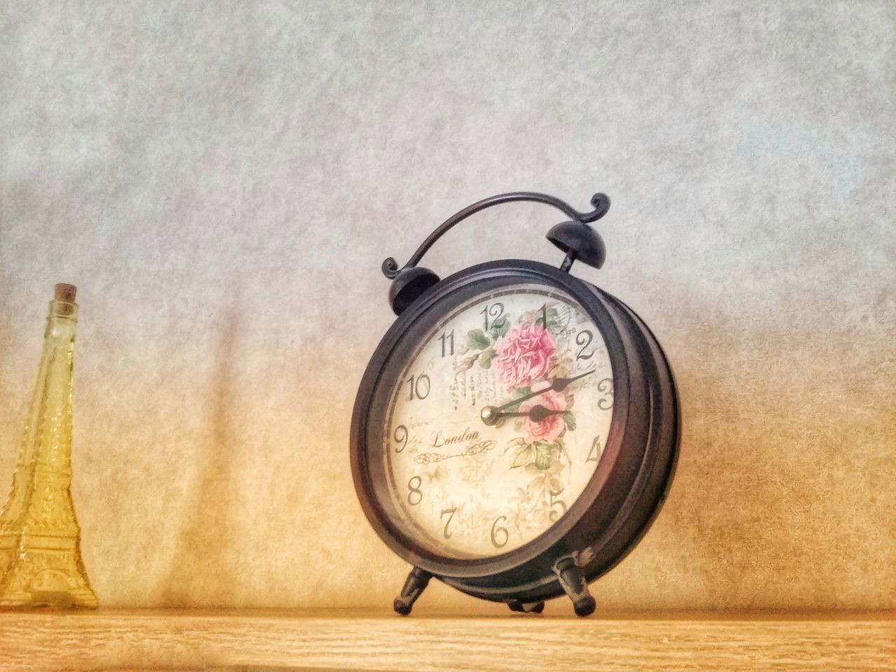 CLOSE-UP OF CLOCK ON WALL