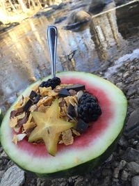 Close-up of breakfast at lakeshore