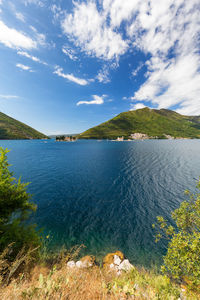 Scenic view of sea against cloudy sky