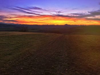 Scenic view of landscape at sunset