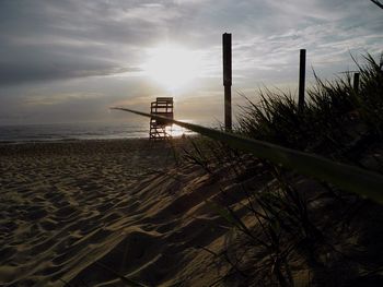 Surface level view of beach at sunset