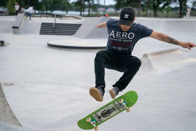 Man skateboarding on skateboard in city