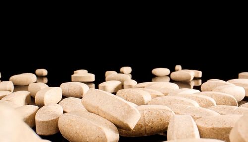 Close-up of candies against black background