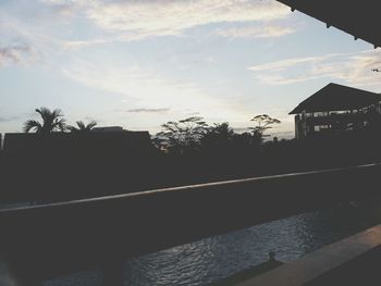 Built structure against sky at sunset