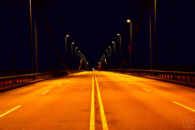 View of road illuminated at night