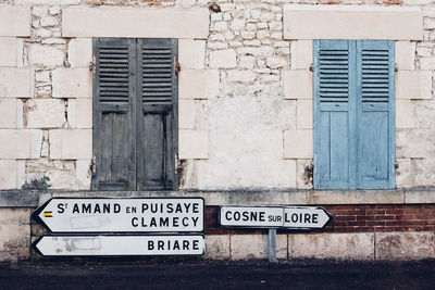 Information sign on wall of building