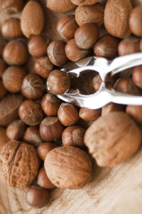 Close-up of walnuts and hazelnuts on table