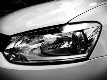 Reflection of car on side-view mirror