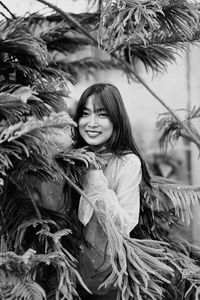 Portrait of smiling young woman in winter