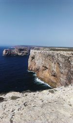 Scenic view of sea against blue sky