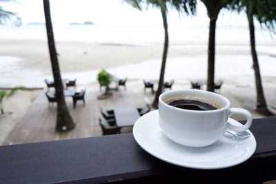 Close-up of coffee served on table