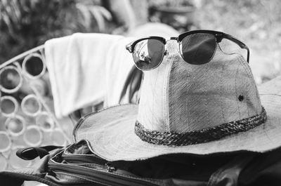 Close-up of sunglasses against sky