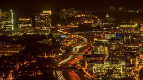 Illuminated cityscape at night