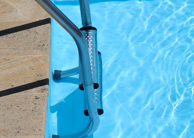 High angle view of ladder in swimming pool