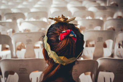 Close-up rear view of woman with leaf headband