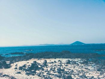 Scenic view of sea against clear sky