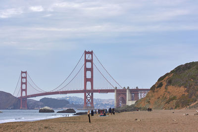 View of suspension bridge at beach