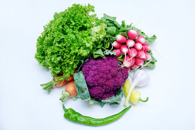 High angle view of vegetables on white background