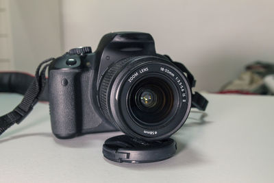 Close-up of camera on table