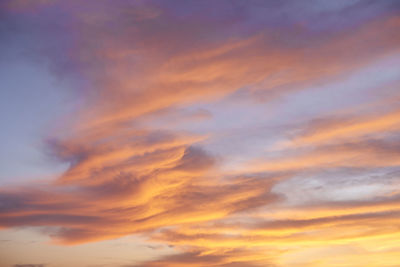 Low angle view of dramatic sky during sunset