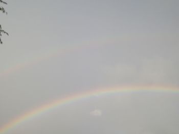 Low angle view of rainbow against sky