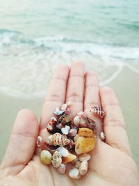 Close-up of hand holding water