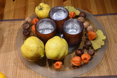 Fruits in basket on wood